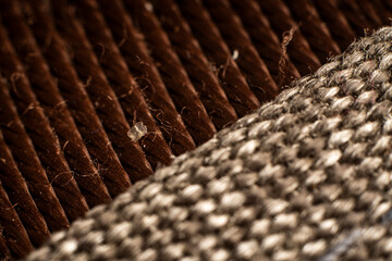 Richly textured fabric showcasing intricate patterns in warm brown tones