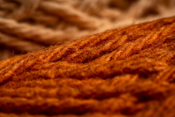 Textured brown fabric showcasing a rich weave pattern ideal for vintage fashion and decor
