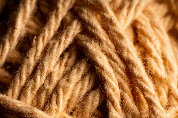 Explore the intricate weave and warm hues of vintage textile fabric in a close-up view