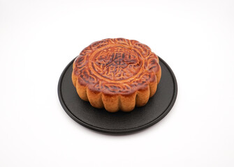 Japanese mooncake filled with red bean isolated on white background.