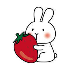 大きな苺を持っている白いうさぎ