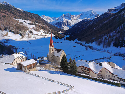 Riva di Tures (Rein in Taufers), an idyllic village in the Alps, South Tyrol, Italy, on a beautiful winter day