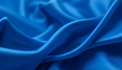 Obraz premium Luxurious Blue Satin Silk Texture in 4K Resolution, Featuring Soft Flowing Waves for Fashion, Interior, and High-End Design Projects.