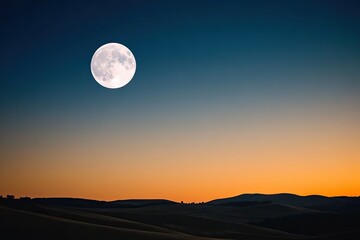 Bright moon illuminates tranquil landscape, showcasing serene tw