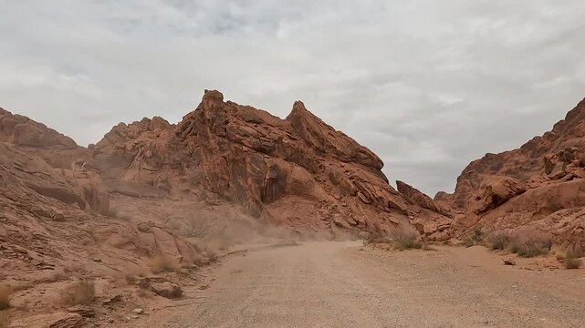 Logandale Nevada red rock recreation off road riding POV 1. Southern desert near Valley of Fire State Park. Red sandstone, mountain, sand trails, valley canyons. Erosion wind water. Outdoor extreme.