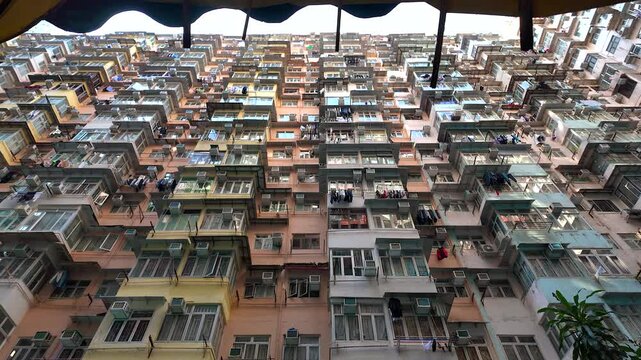 Hong Kong &ndash; January 11, 2025: Courtyard and colorful building facade in Hong Kong, Quarry Bay (a.k.a. Monster Building)