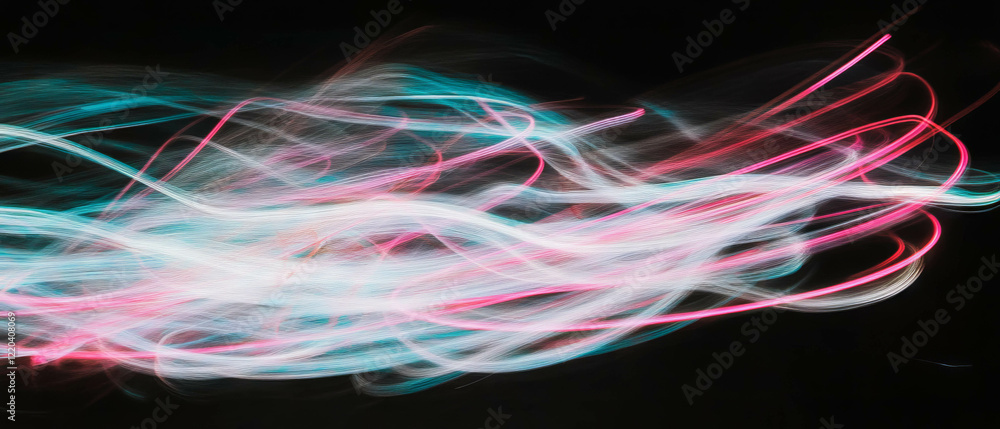 Poster dynamic light streaks creating abstract patterns of movement and color in dark background