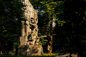 Vietnamese War Memorial Statue in a Serene Park Setting
