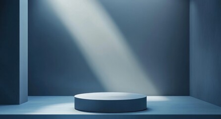 Dark blue studio with spotlight on round pedestal.