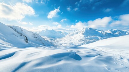 Obraz premium Majestic Winter Mountain Landscape: A Breathtaking Panorama of Snowy Peaks Under a Vivid Blue Sky
