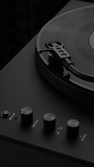 A vinyl record spinning on a turntable, creating music for the atmosphere