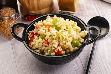 Vegan cuisine couscous with vegetables