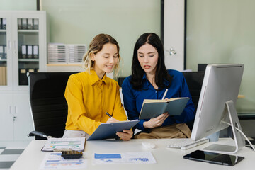 business woman hand using calculator to calculate office finance