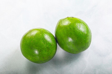 Two ripe green exotic avocado fruit