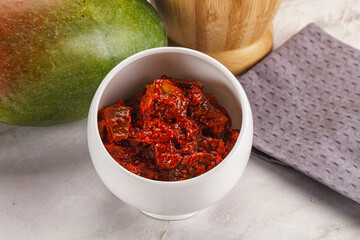 Spicy pickled raw green mango