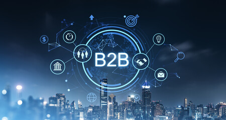 B2B concept with digital network icons over modern cityscape at night.