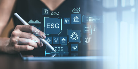 ESG investment strategy illustrated with holographic icons for environmental and business growth concepts.