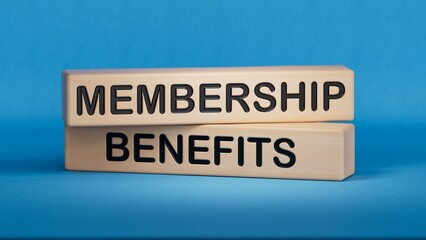 MEMBERSHIP BENEFITS word. Wooden cube blocks. Copy space.3D rendering on blue background.