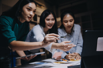 Group of young asian creative business brain storm meeting presentation,discussing roadmap to product launch, planning,strategy,new business development,working with new startup project in office.