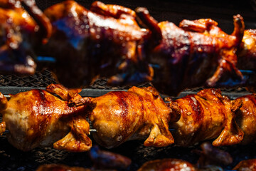 grilling whole chickens on the street