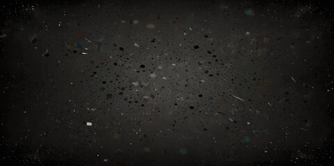 Abstract black distressed concrete wall white particles over isolated black background.