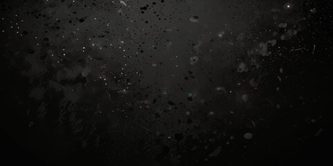 Abstract black distressed white doted particles scattered across overlay black background.