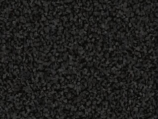 Fototapeta premium Close-up texture of a black, coarse, granular material or surface