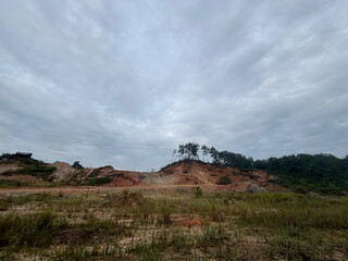 Morning View of a Deforested Hilltop: Clay Mining and its Environmental Consequences