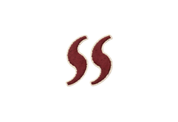 Two maroon comma symbols on a transparent background