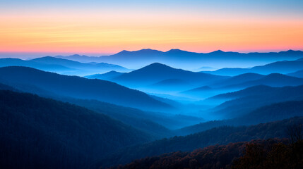 A majestic mountain range at sunrise.