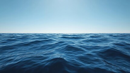 Fototapeta premium Clear sky serene ocean deep blue hue gentle waves lapping shore