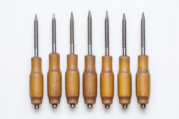 Screwdrivers Arranged by Size on Plain Background