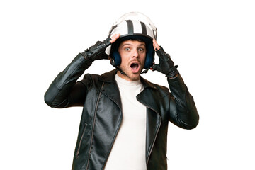 Brazilian man with a motorcycle helmet over isolated chroma key background with surprise expression