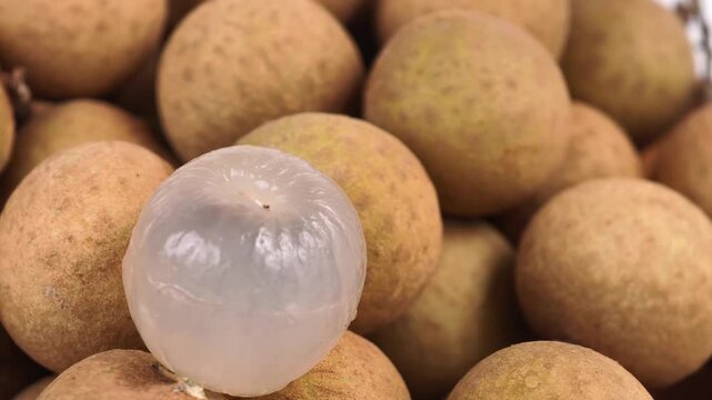 Close-up of longan on a rotating plate