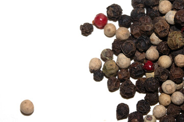 Close up of mixed pepercorn on white background