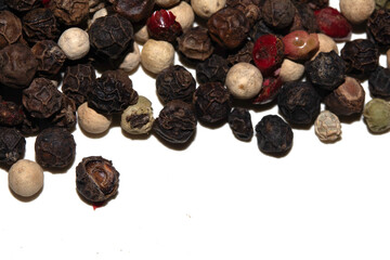 Close up of mixed pepercorn on white background