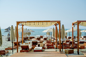 Lounge area on the seashore, restaurant on the beach. 