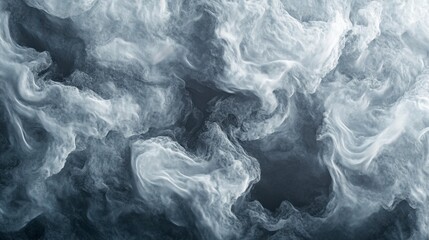 Obraz premium A textured abstract resembling storm clouds, with swirling grays and whites