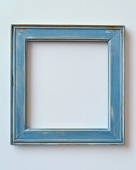Vintage blue wooden frame on white wall background