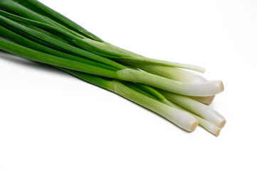 Fresh green onions ready for culinary use in a bright kitchen setting