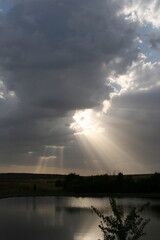 Rays of sun getting out of the clouds