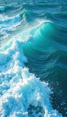 Deep blue turquoise water, rolling waves with frothy whitecaps , sunlight, foam, peaceful