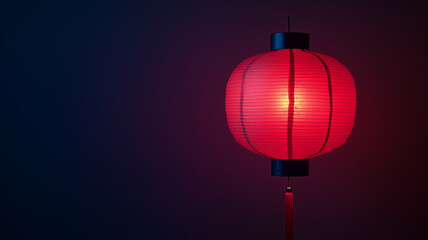 Obraz premium Red Chinese Lantern Glowing in the Dark