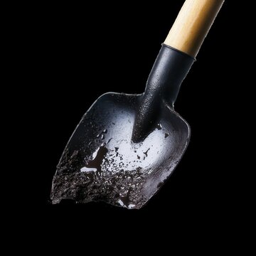 A shovel with a black handle and a black scoop is shown on a white background. transparent background