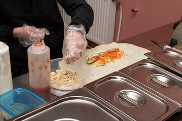Process of preparing traditional Turkish fast food - shawarma	