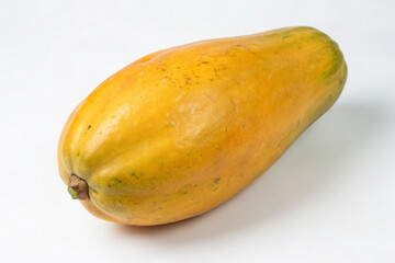 Whole fresh papaya fruit on a white background