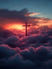 Fototapeta premium A cross in the middle of the clouds at sunset
