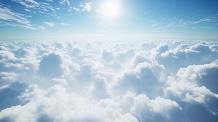 Expansive view of fluffy clouds under a bright sun, creating a serene atmosphere in the sky