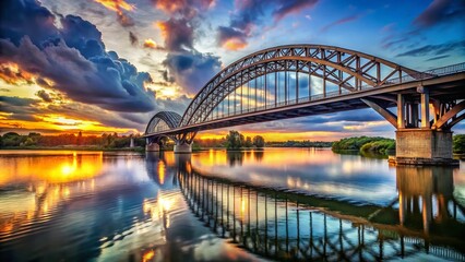 Naklejka premium Majestic Steel Arch Bridge Spanning River, Industrial Architectural Photography