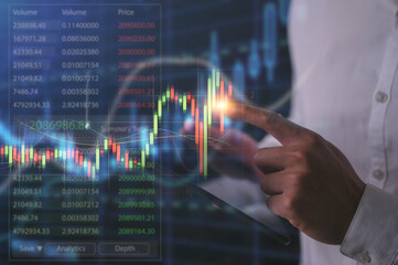 Businessman trader show growing virtual hologram stock trading pointing to arrow up to forecast...